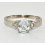 9ct White Gold Diamond & Aquamarine Solitaire with Heart Shoulders. Size R