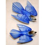 Two vintage Poole Pottery bluebird wall plaques in excellent original condition. The largest is 12.