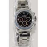 1997 Rolex Stainless steel Daytona with black dial, Model no. 16520, Box and Papers. Benefits from