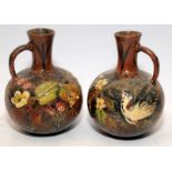 Pair of early Watcombe Pottery small single handled jugs. 12cms tall