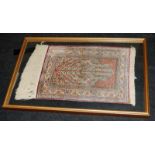 Antique Turkish Kayseri rug sample presented framed under glass. O/all frame size 85.5cms x 57cms