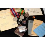 Collection of curios to include WW2 medals, various badges and other military related ephemera