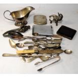 A collection of silver and silver plated items and other curios