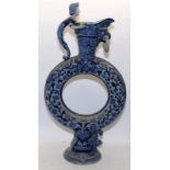 Large German Westerwald style stoneware ring jug with cobalt blue decoration on a grey ground. 75cms