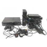 Collection of Gaming Consoles Xbox One and 360, and a PlayStation 2 along with Controllers