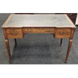 Edwardian mahogany ladies writing table in the inlaid Sheraton style standing on cabriole legs and