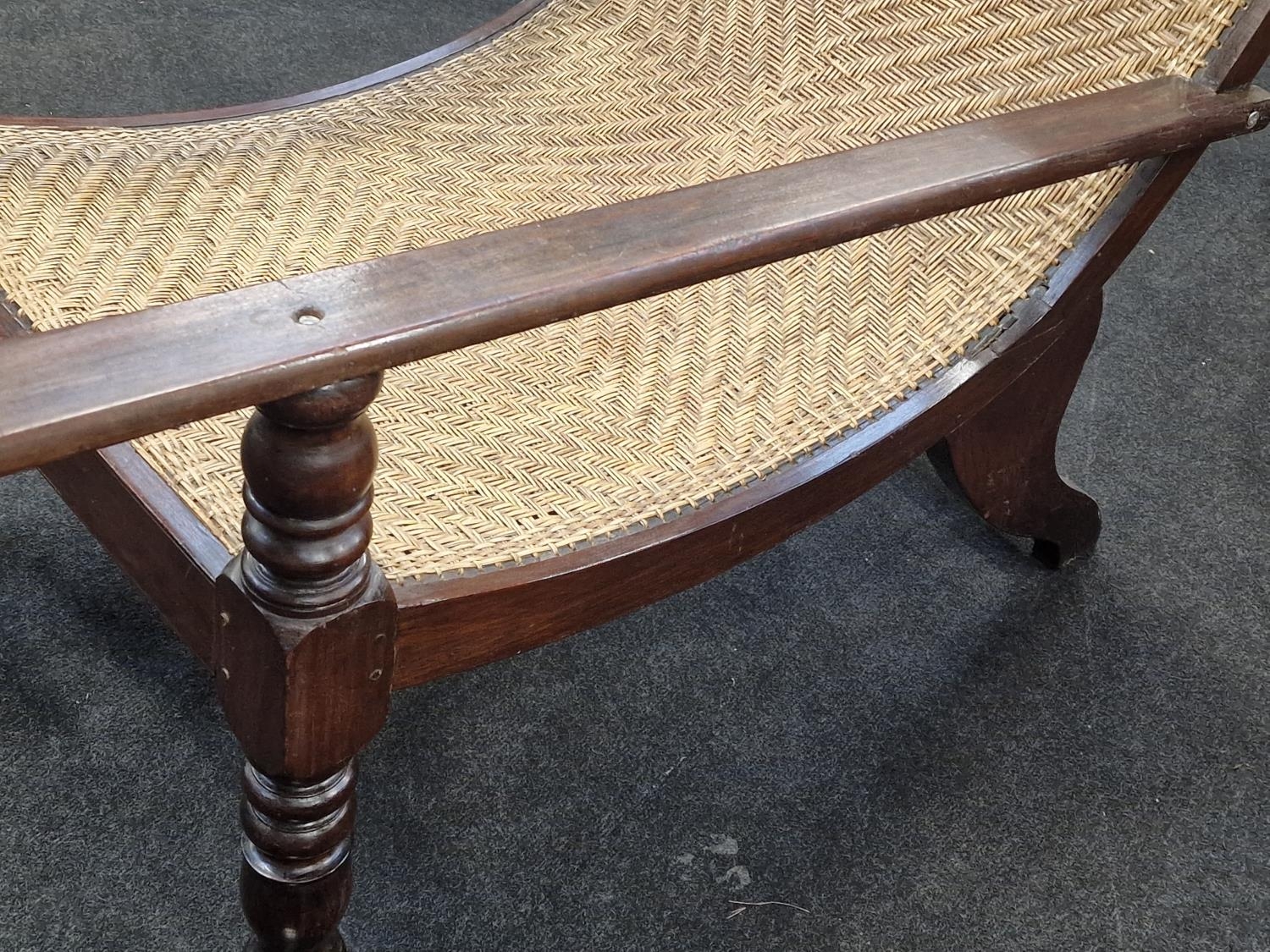 Anglo Dutch colonial Plantation chair with arm extenders on turned supports with a woven back rest - Image 3 of 5