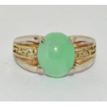 A 925 silver/gold and jadeite ring Size T