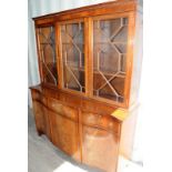 Large break front wall unit comprising three doors glazed unit over unit comprising three drawers