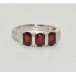 An Allure 925 silver and garnet ring Size N