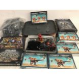 Mixes collection of War Hammer kits and books unchecked