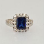 A 925 silver CZ and blue stone dress ring Size O