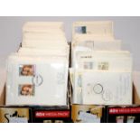 A large quantity of First Day Covers contained within two boxes