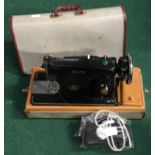 Alfa vintage electric sewing machine in case.