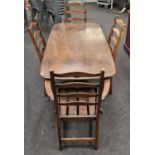 Ercol refectory table together with 4 Ercol blue label refectory chairs to include carvers, table is