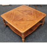 Mahogany square coffee table with brass castors and fluted supports and under tray 40x90x90cm