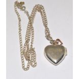 Clogau 9ct gold/silver locket heart and chain.