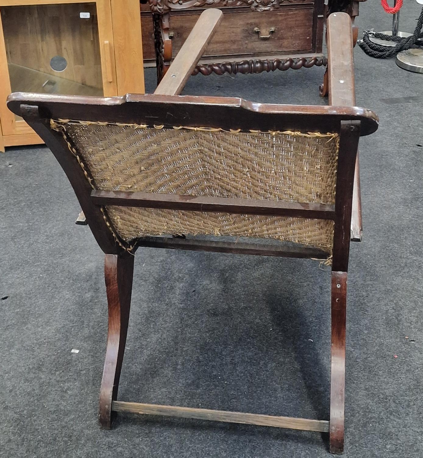 Anglo Dutch colonial Plantation chair with arm extenders on turned supports with a woven back rest - Image 5 of 5