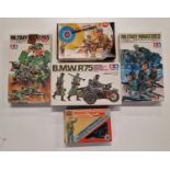 Five boxed model kits not checked for completeness.