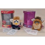 Two boxed vintage Furby's both with boxes and instructions to include Limited Edition President