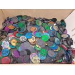 Large box containing a collection of unsorted pogs. Huge assortment to look through!