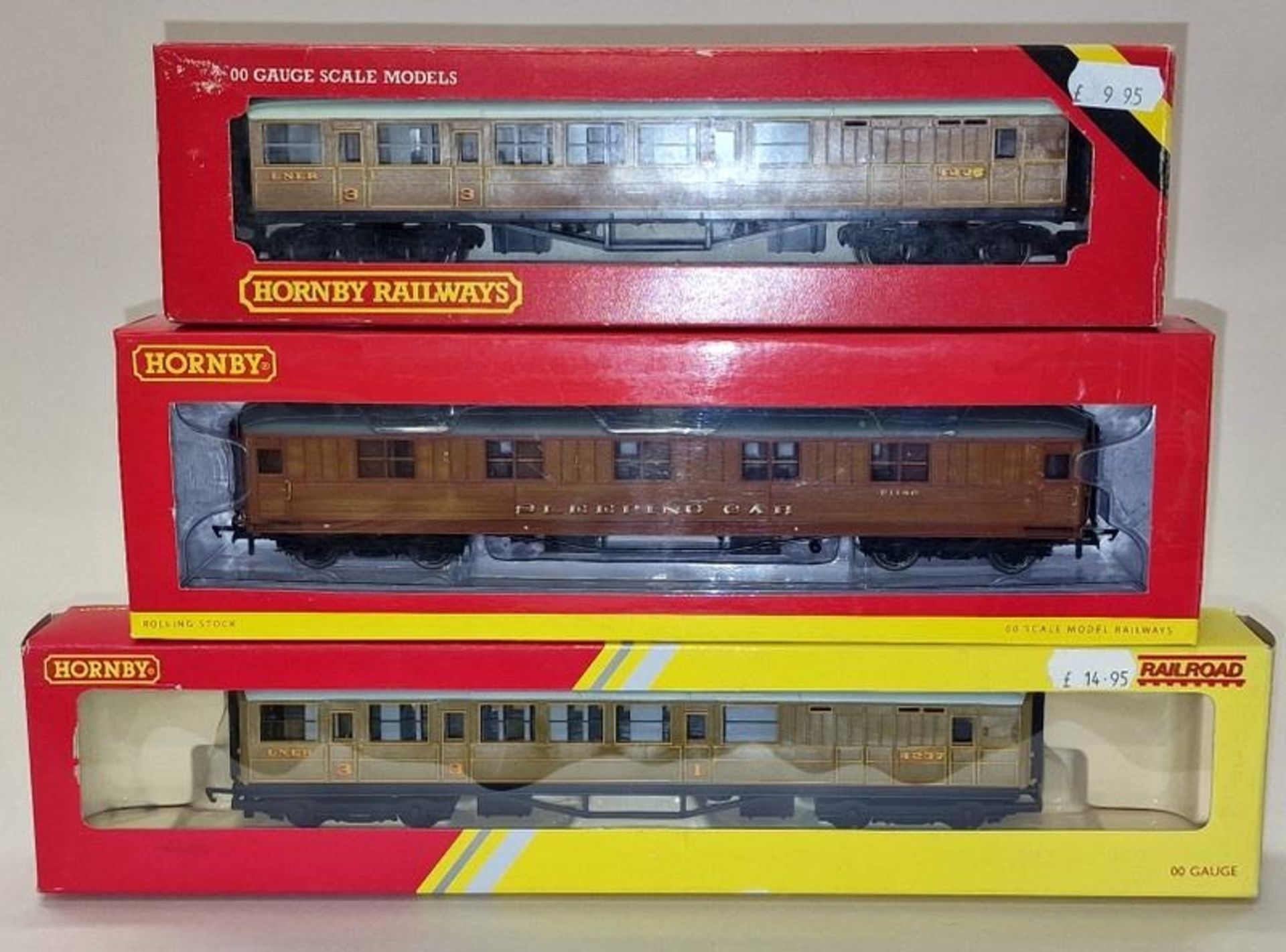 Hornby Railways OO Gauge three boxed rolling stock coaches in generally excellent condition.