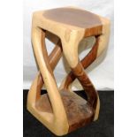 Wooden stool, seat height 51cms, hewn from a single piece of wood