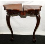 Pair of vintage mahogany corner stands supported by a single cabriole leg with ball and claw foot.