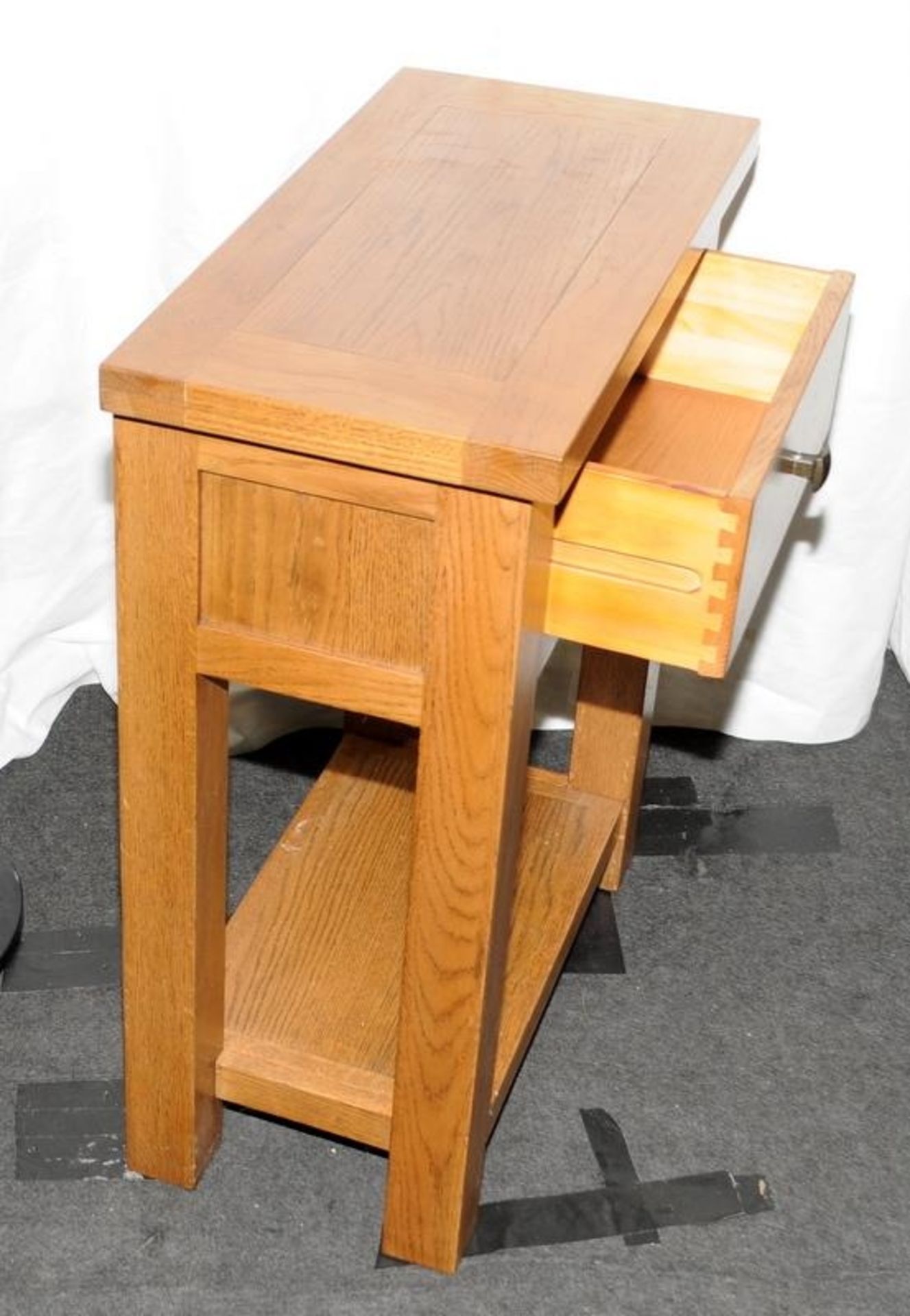 Solid oak side table with single drawer over low shelf. 75cms high x 60cms wide x 30cms deep - Image 2 of 3