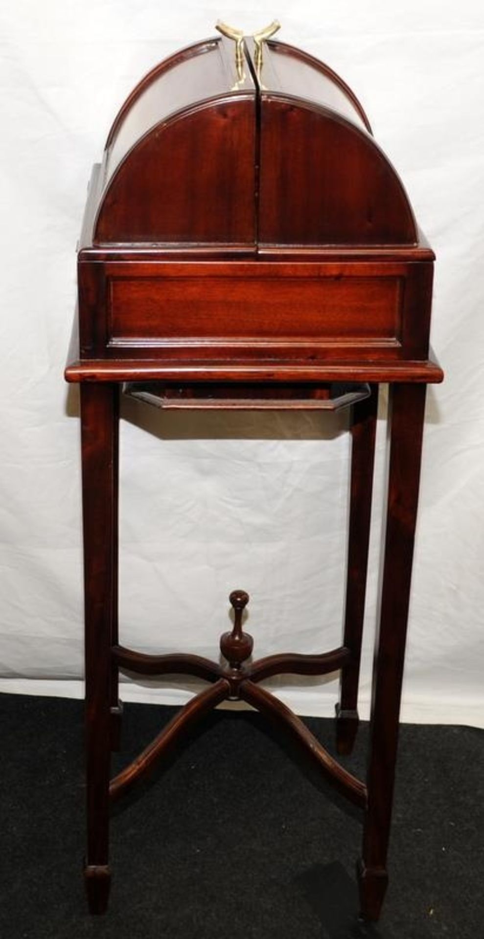 Contemporary mahogany dome topped bottle store on tapering square legs with 'x' stretcher. Holds 4