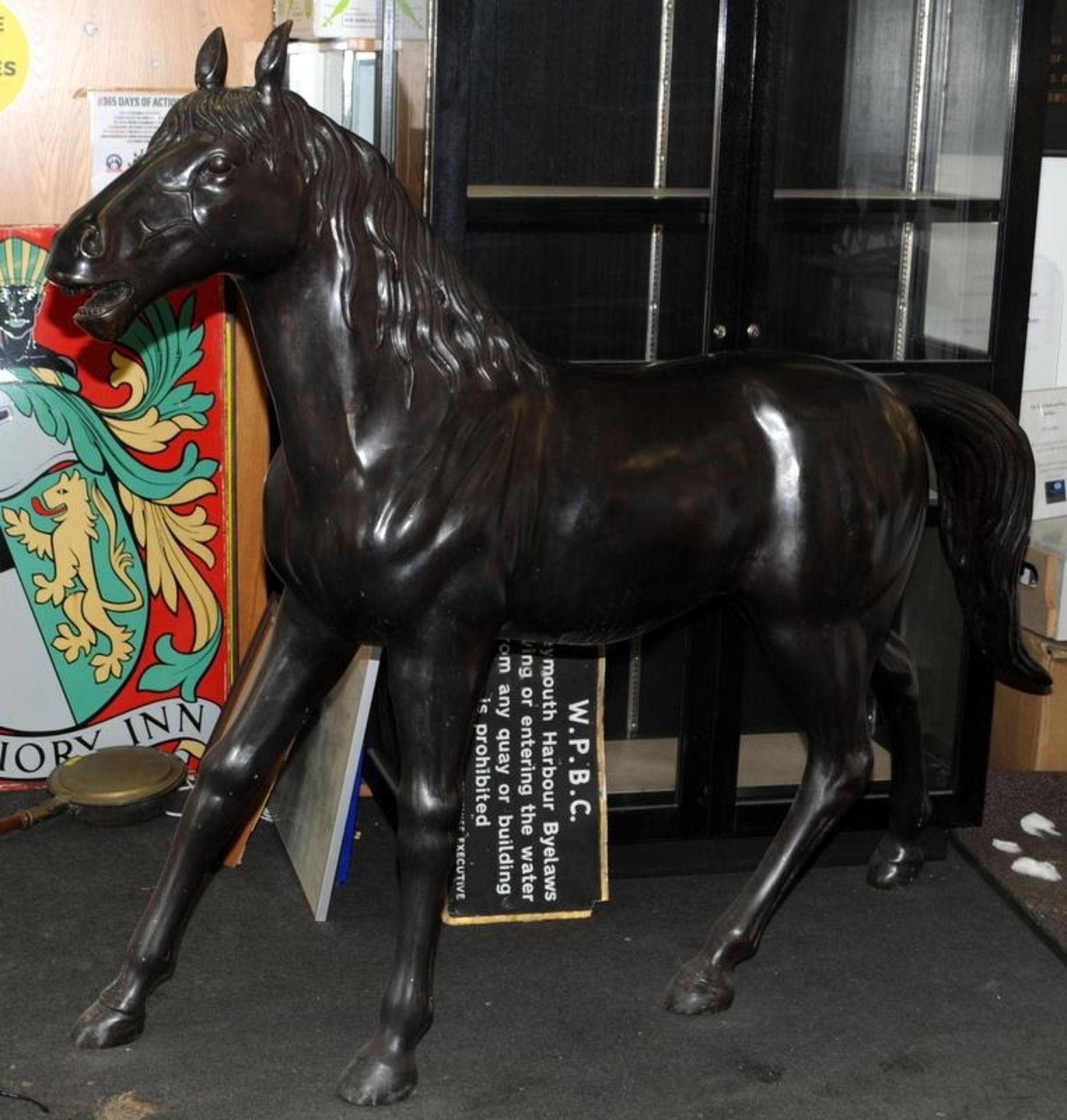 Half (?) life size sculpture in bronze of a horse 160x180x40cm