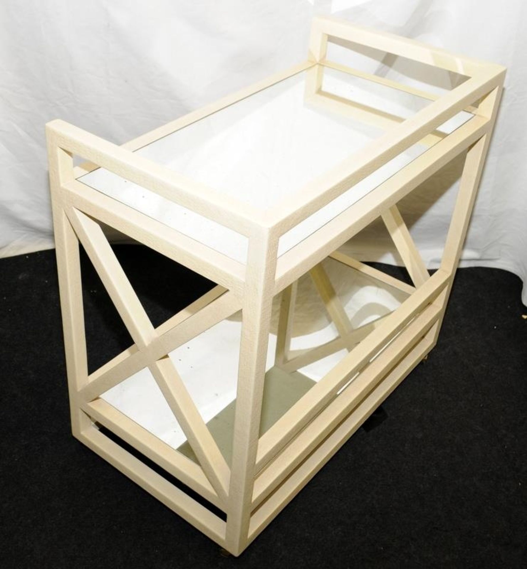 Contemporary cream finished wood framed two tier drinks trolley on castors with mirrored shelves - Image 3 of 3