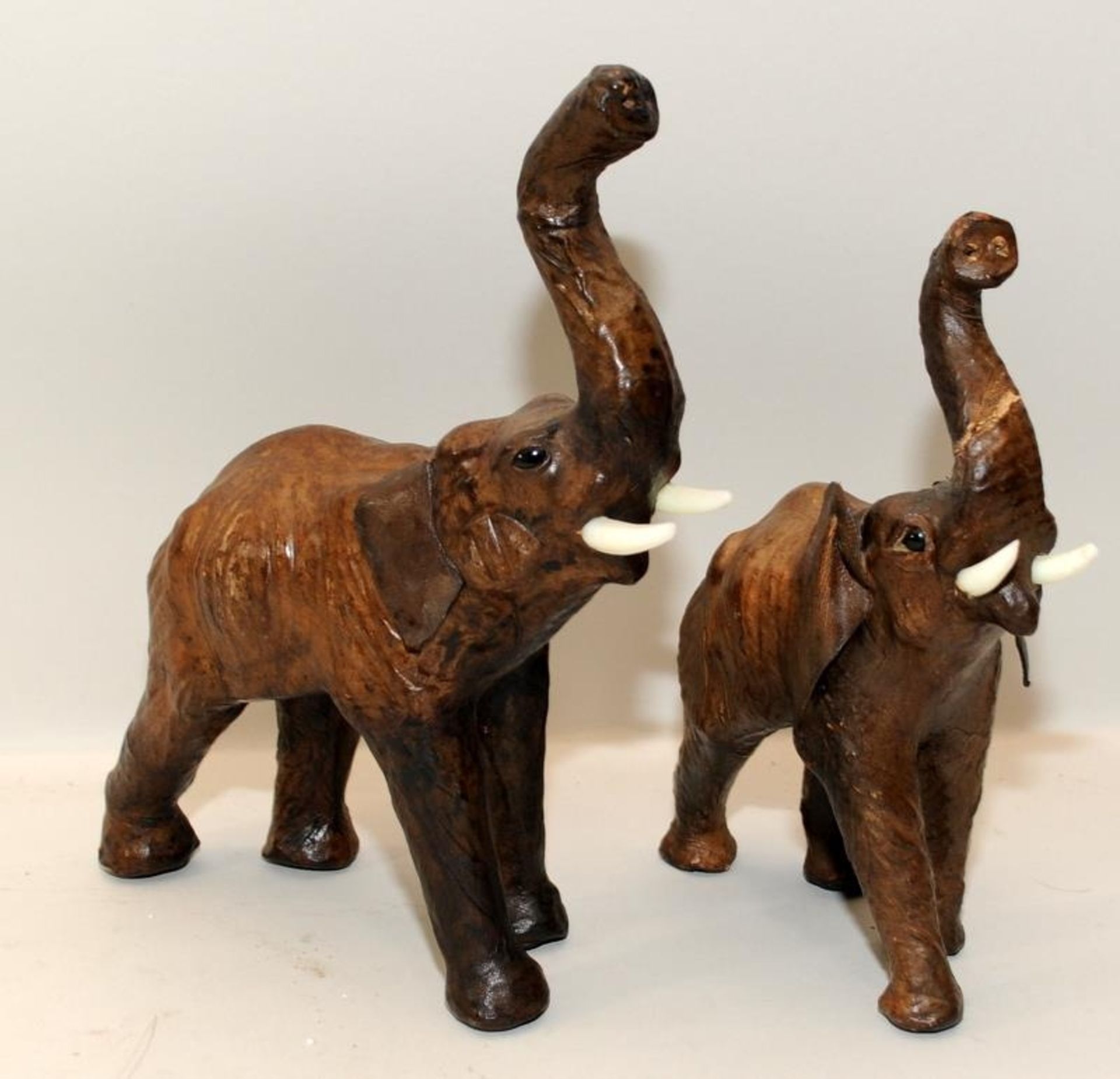 Pair of leather wrapped wooden elephants created for and retailed by Liberty's of London. Larger - Image 2 of 2