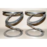 Pair of glass and chrome side tables of circular stack form. 45cms tall