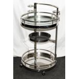 Mid century large chrome and glass bar cart.