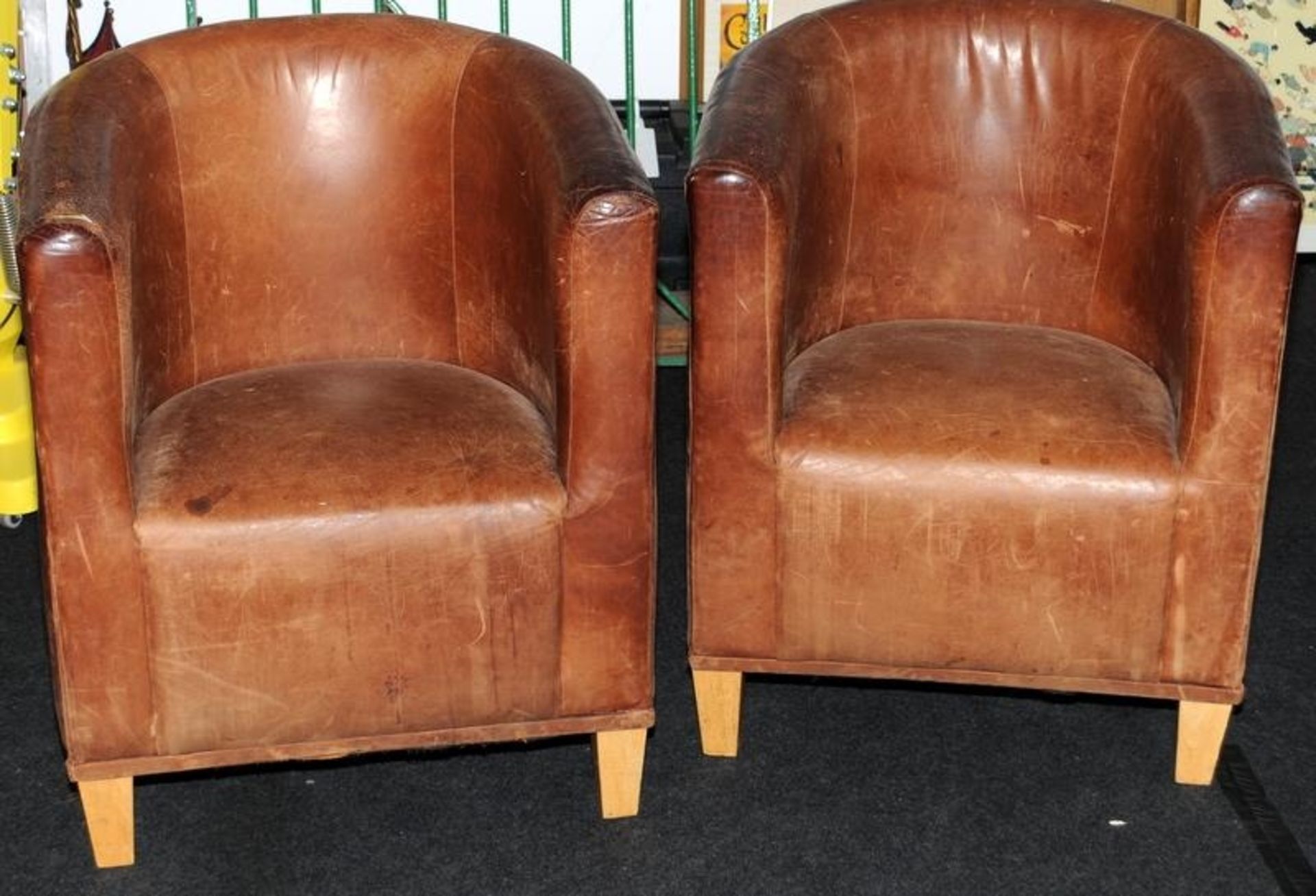 Pair of Vintage leather Tub Chairs