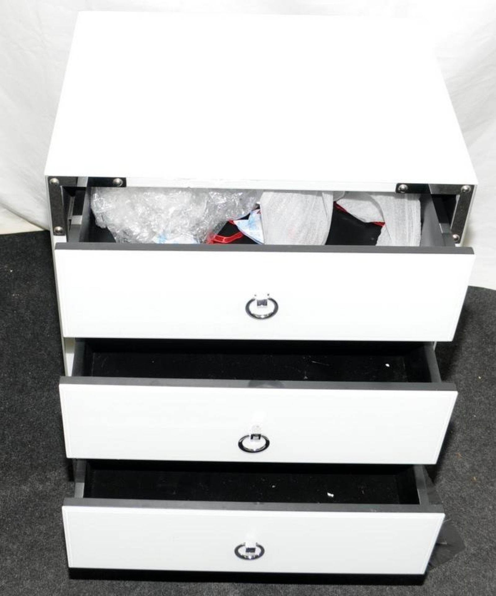 Contemporary white glass three drawer bedside chest on chrome feet with chrome furniture and - Image 2 of 4