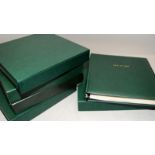 Five good quality empty green Isle of Man stamp albums with slipcases.