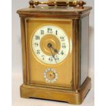 Quality antique striking and repeating brass carriage clock. Bevelled glass panels with visible