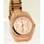 Michael Kors mid size working wristwatch.