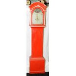 Antique grandfather clock painted in pillarbox red. Painted dial featuring rocking ship