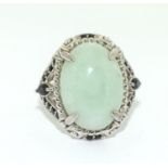 A large 925 silver and jadeite green ring, Size N 1/2.