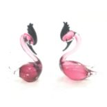 A pair of Murano birds.