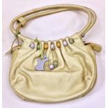Radley ladies beige leather handbag with tags still attached.