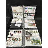 Three albums of assorted first day covers.