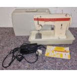 Singer vintage model 367 sewing machine in case with instructions.