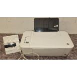 A HP Deskjet 2540 multi function printer together with a Morphy Richards clock radio (2).