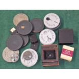 Collection of vintage film spools and reels together with other film making equipment.