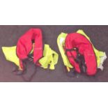 Two Waveline life jackets.