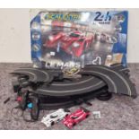 Scalextric Le Mans racing set with box (tatty) and cars. Not checked for completeness.